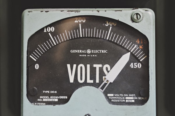 Analog panel voltmeter reading up to 450 volts